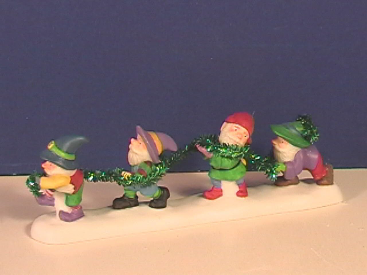 Department 56 North Pole Village Tangled in Tinsel Figurine