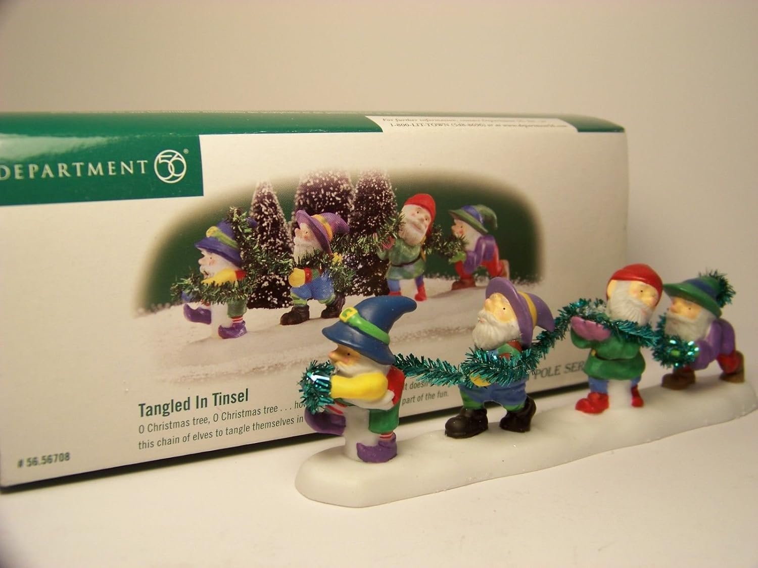 Department 56 North Pole Village Tangled in Tinsel Figurine